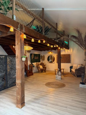 Suite Romantique Love Room Balinaise avec jacuzzi et sauna privé
